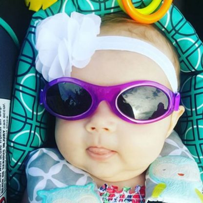 Baby in Adventure Banz Purple sunglasses