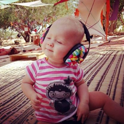 Baby swaying to the music in Geo Mini Earmuffs
