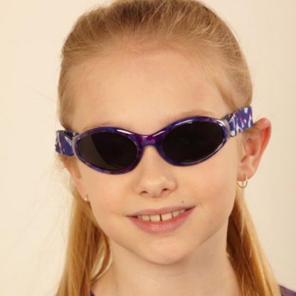 Girl in Adventure Banz Tortoiseshell Purple sunglasses