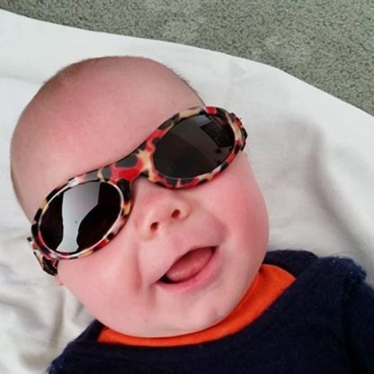 Baby in Adventure Banz Zoo sunglasses