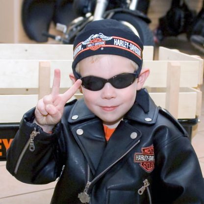 Boy in Adventure Banz Black sunglasses Harley gear